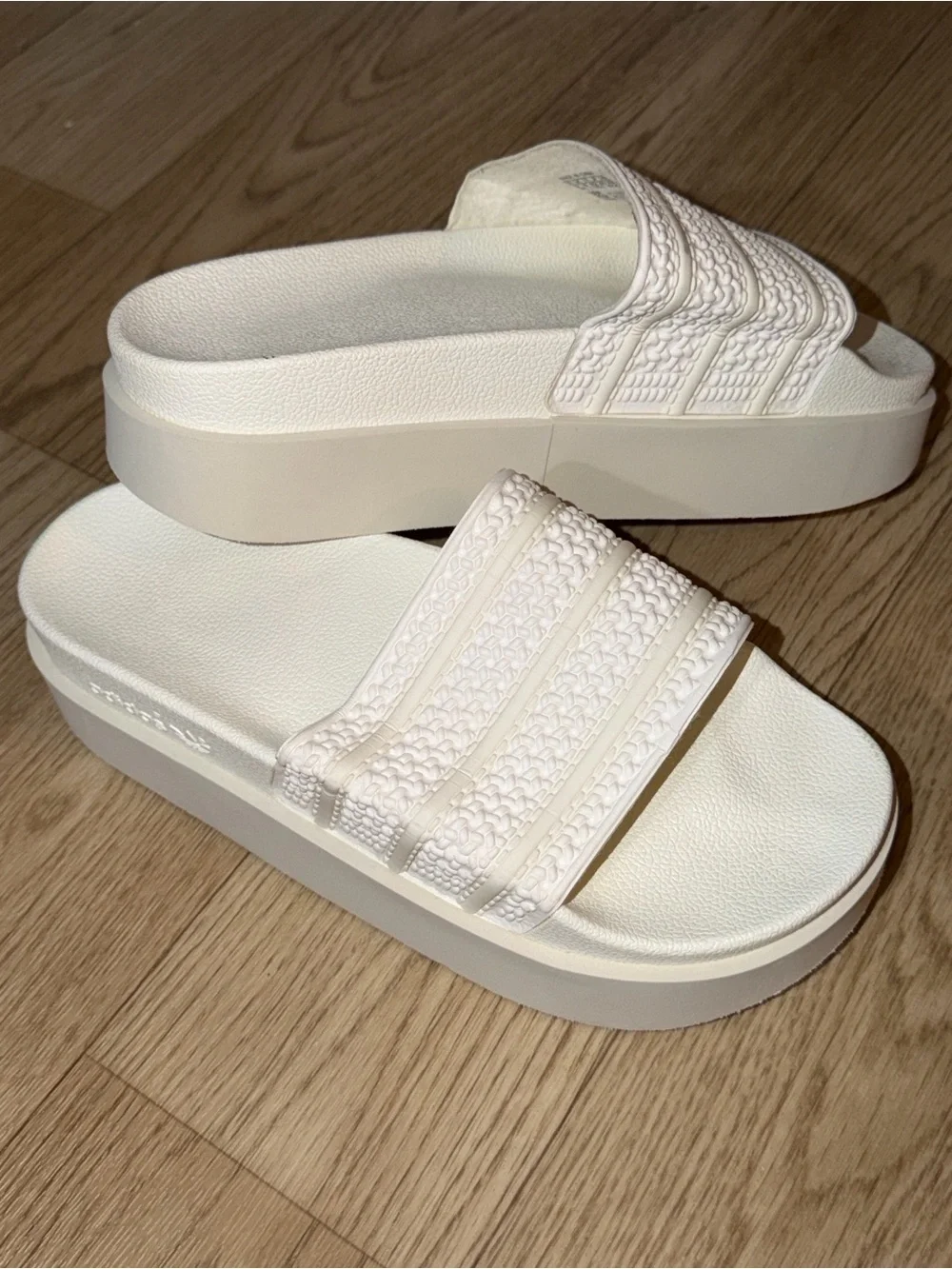 Adidas Originals Adilette Bonega platform sliders in cloud white/off white
